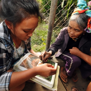 The old tattoo lady handing down the tradition to her granddaughter