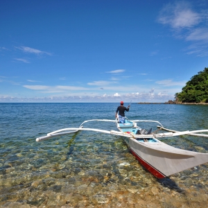 Small outrigger boat for beach hopping