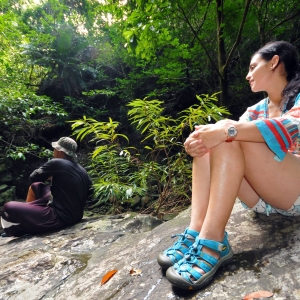 Chilling out on a stream boulder